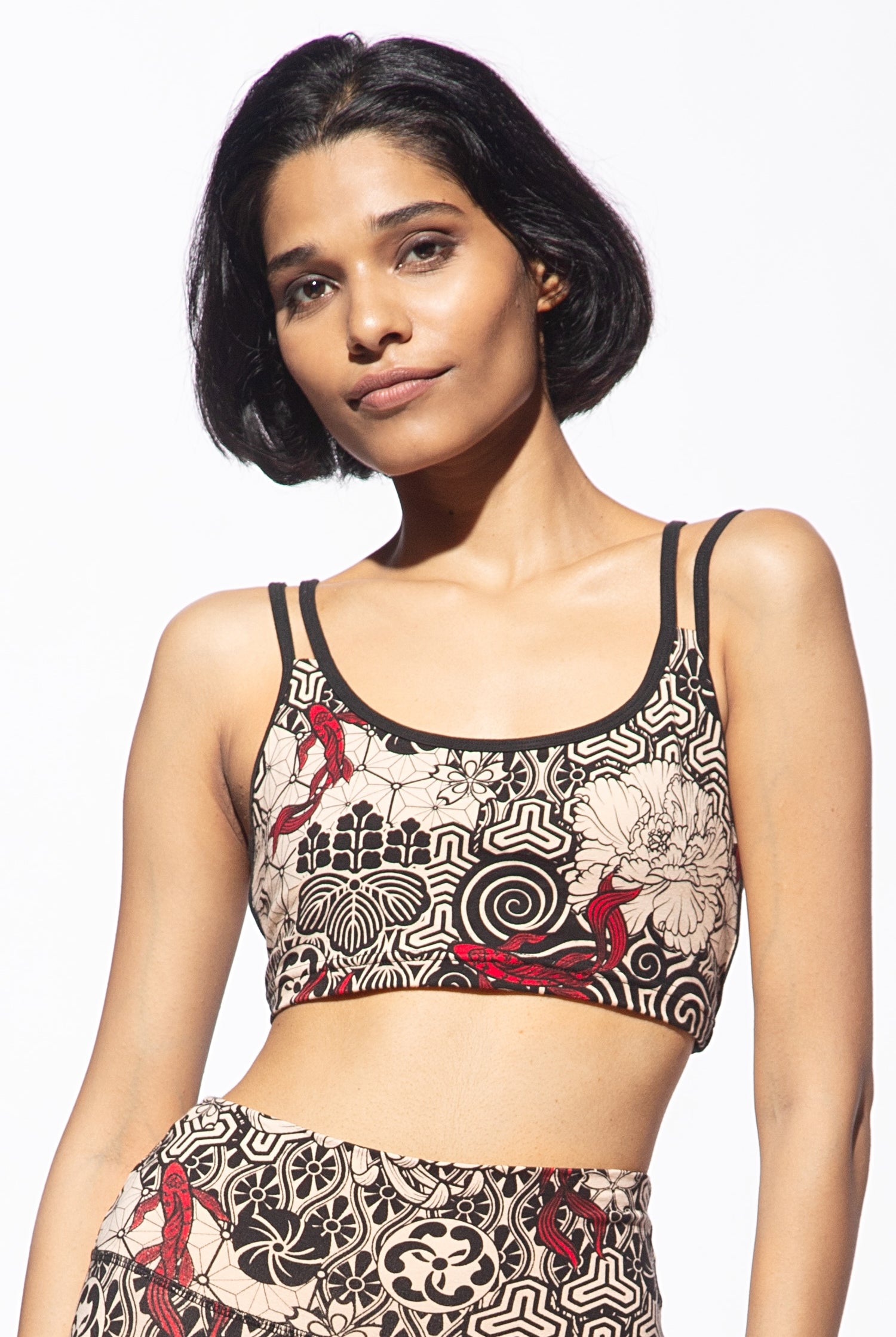 Woman wearing a funky simplicity cross back bra in Cream Black Nagomi print, it is a beautiful janpanese print. Shown from the front