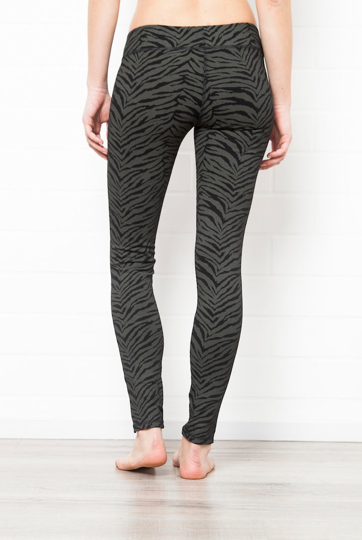 Black greenish zebra leggings medium high waist in cotton spandex shown from the back