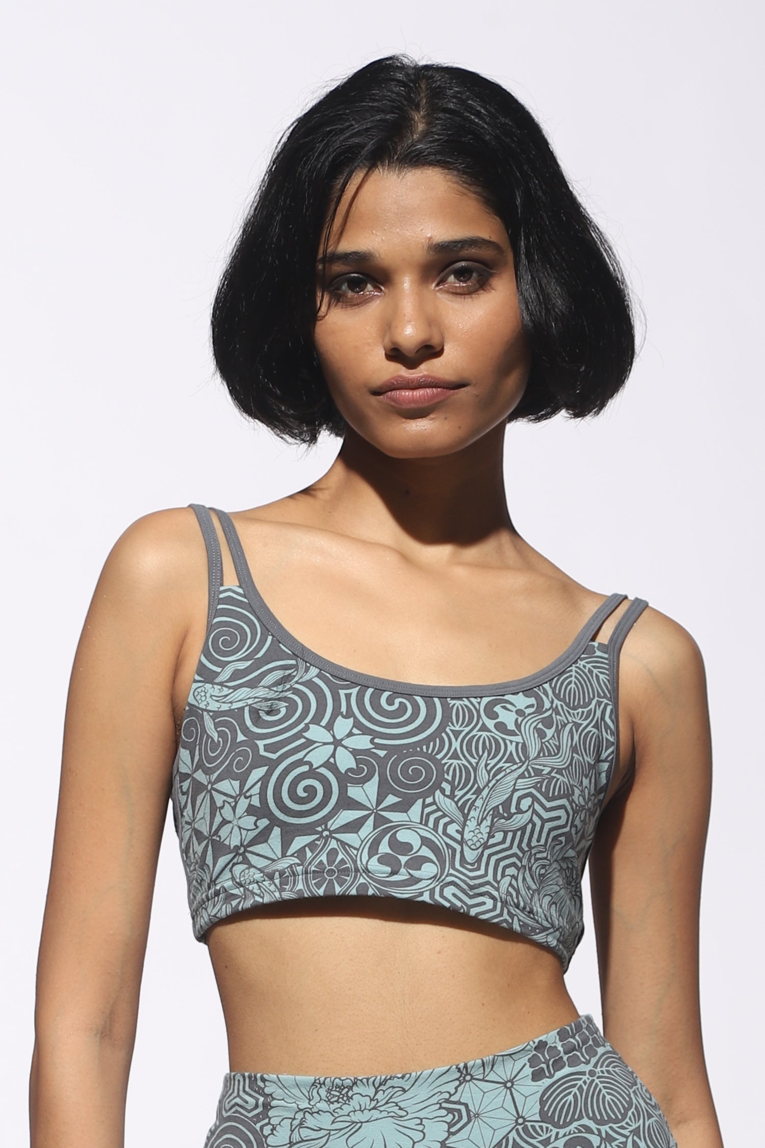 Model wearing a Light Blue with Light Grey Nagomi print cross back bra with our matching High waist leggings - shown from the front. Nagomi is a japanese inspired print